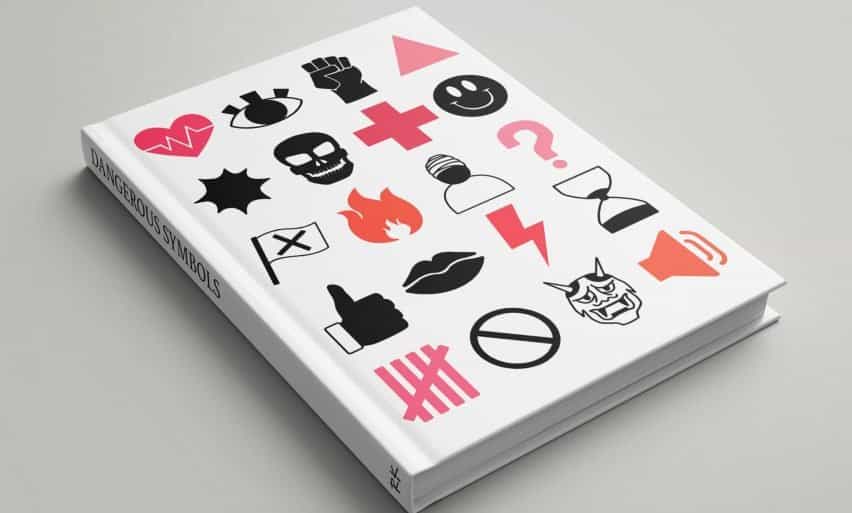 Un libro de diseño gráfico con varios símbolos en su portada