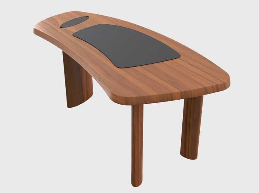 Una fotografía de un escritorio de madera.
