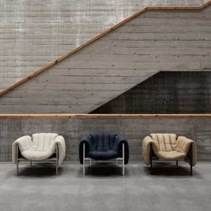 lanzamientos dezeen sala de exposición con productos de Vitra, Hem, Luceplan y Yotsume